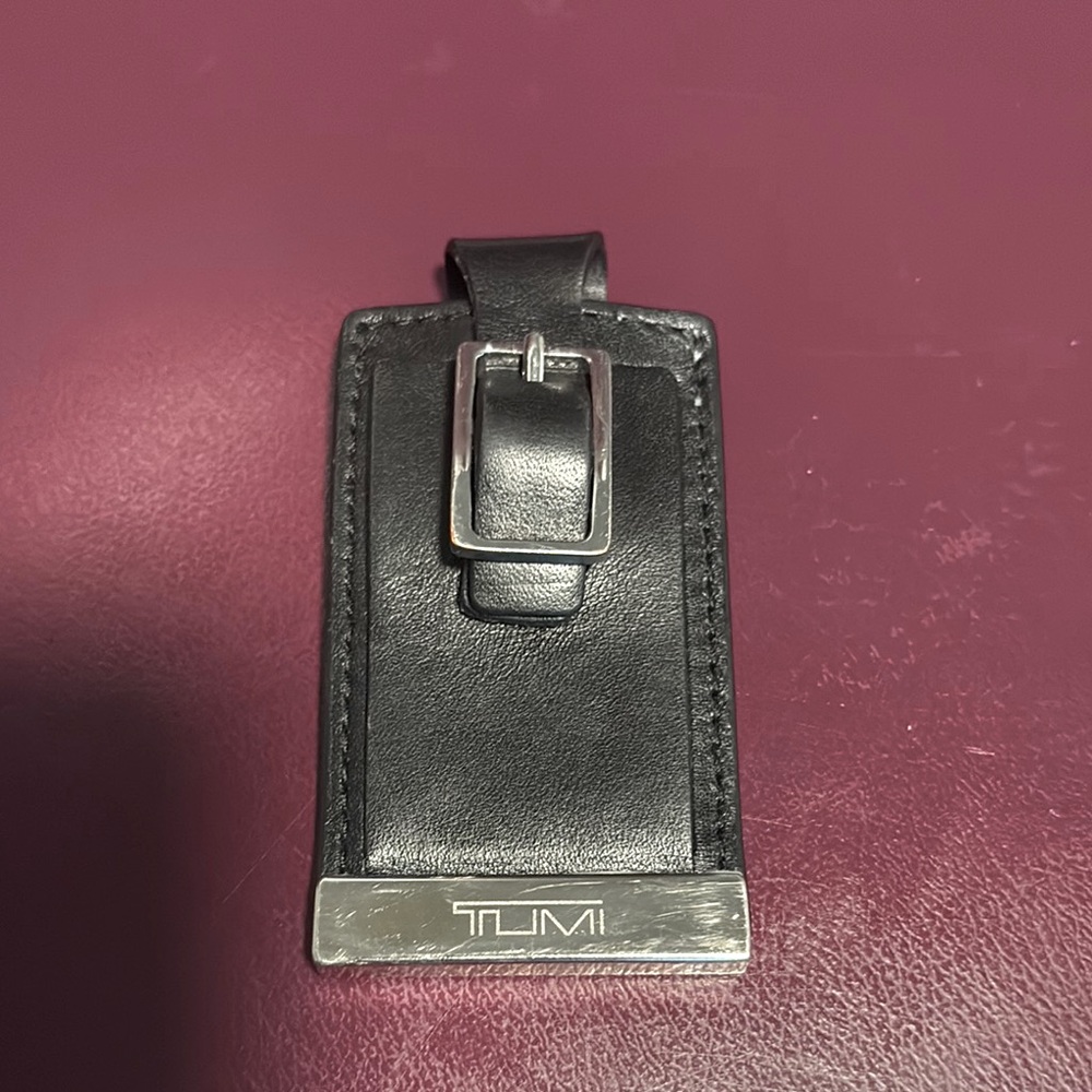 TUMI luggage tag